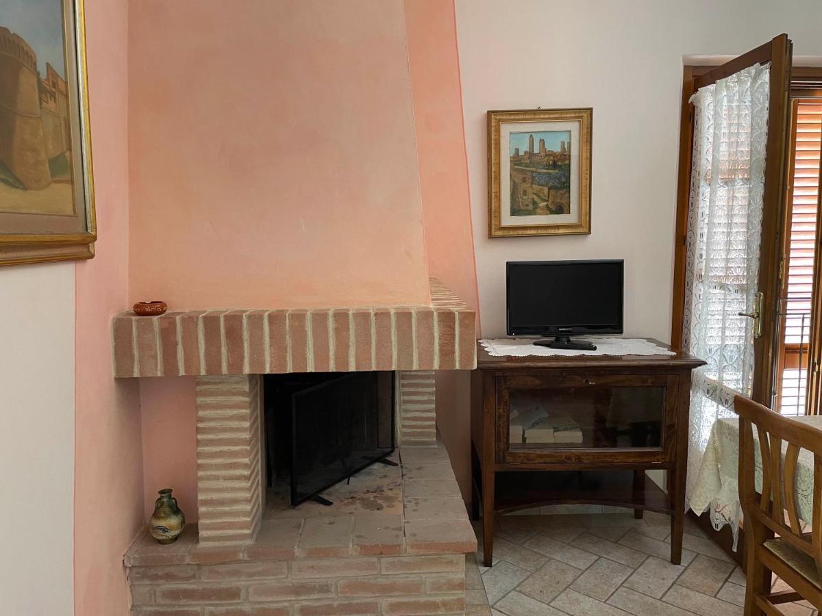 Casa Vacanza Le Case Сан-Джиминьяно Экстерьер фото
