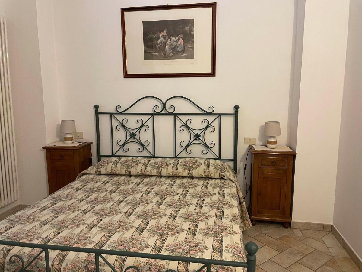 Casa Vacanza Le Case Сан-Джиминьяно Экстерьер фото