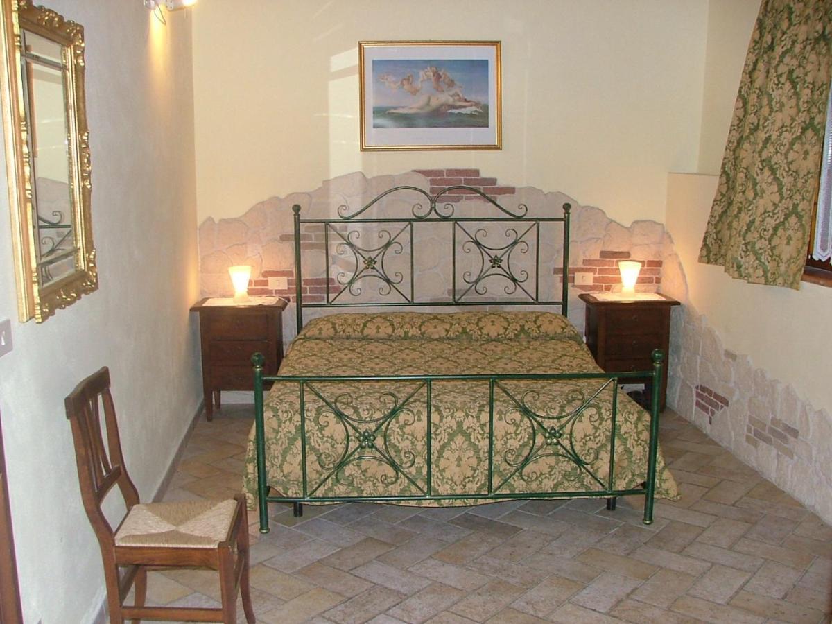 Casa Vacanza Le Case Сан-Джиминьяно Экстерьер фото